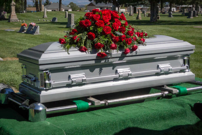Casket,Getting,Ready,To,Be,Lower,At,Cemetary