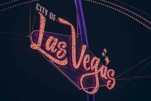shutterstock_2563578249.jpg Neon sign reading 'City of Las Vegas' illuminated at nighte