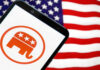 Smartphone displaying red elephant GOP logo USA flag