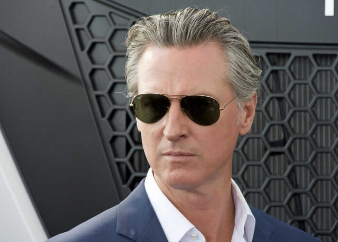 Man wearing sunglasses with a serious expression