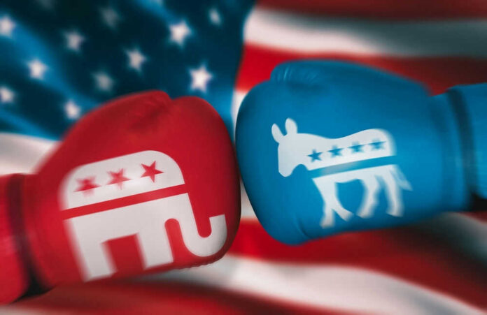 Red and blue boxing gloves with political symbols