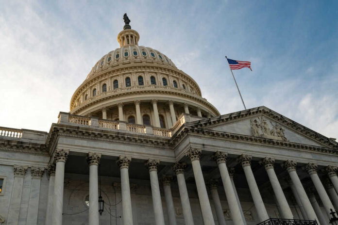 US Capitol building with American flag flying above