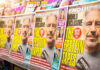 Magazines on display featuring headline about Epstein tapes