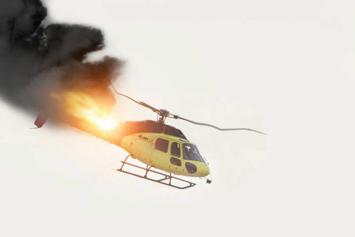 494592478 Helicopter on fire with smoke in the sky