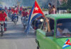 Spy Hubs Emerge Off U.S. Coast People riding motorcycles and car with Cuban flags